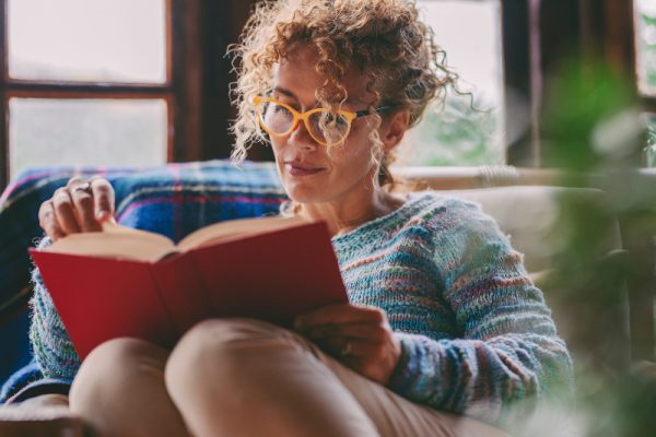 Woman At Home Sitting And Read